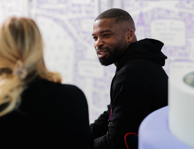 Collegues in conversation at One Manchester offices