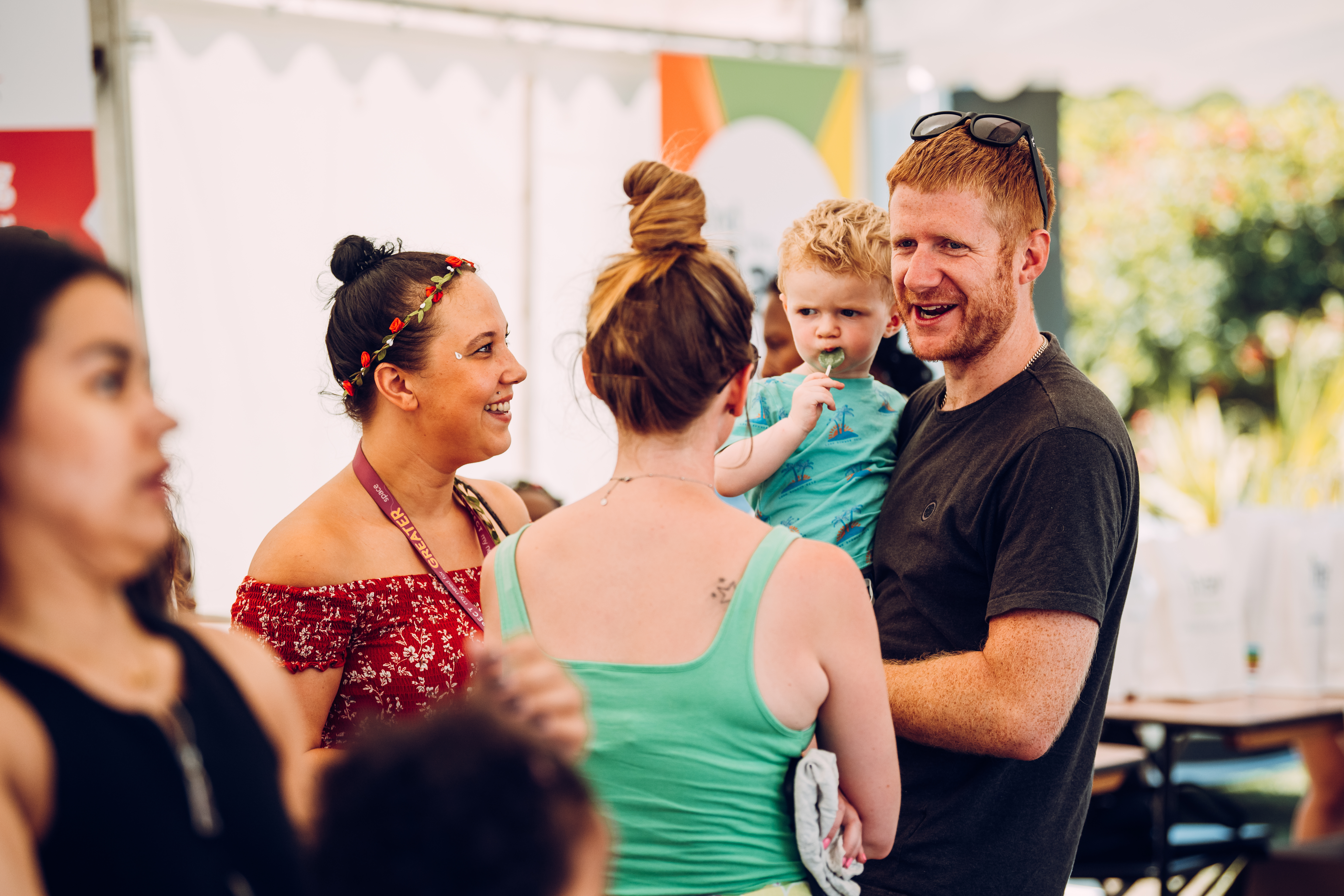 Customer chatting with colleague at event