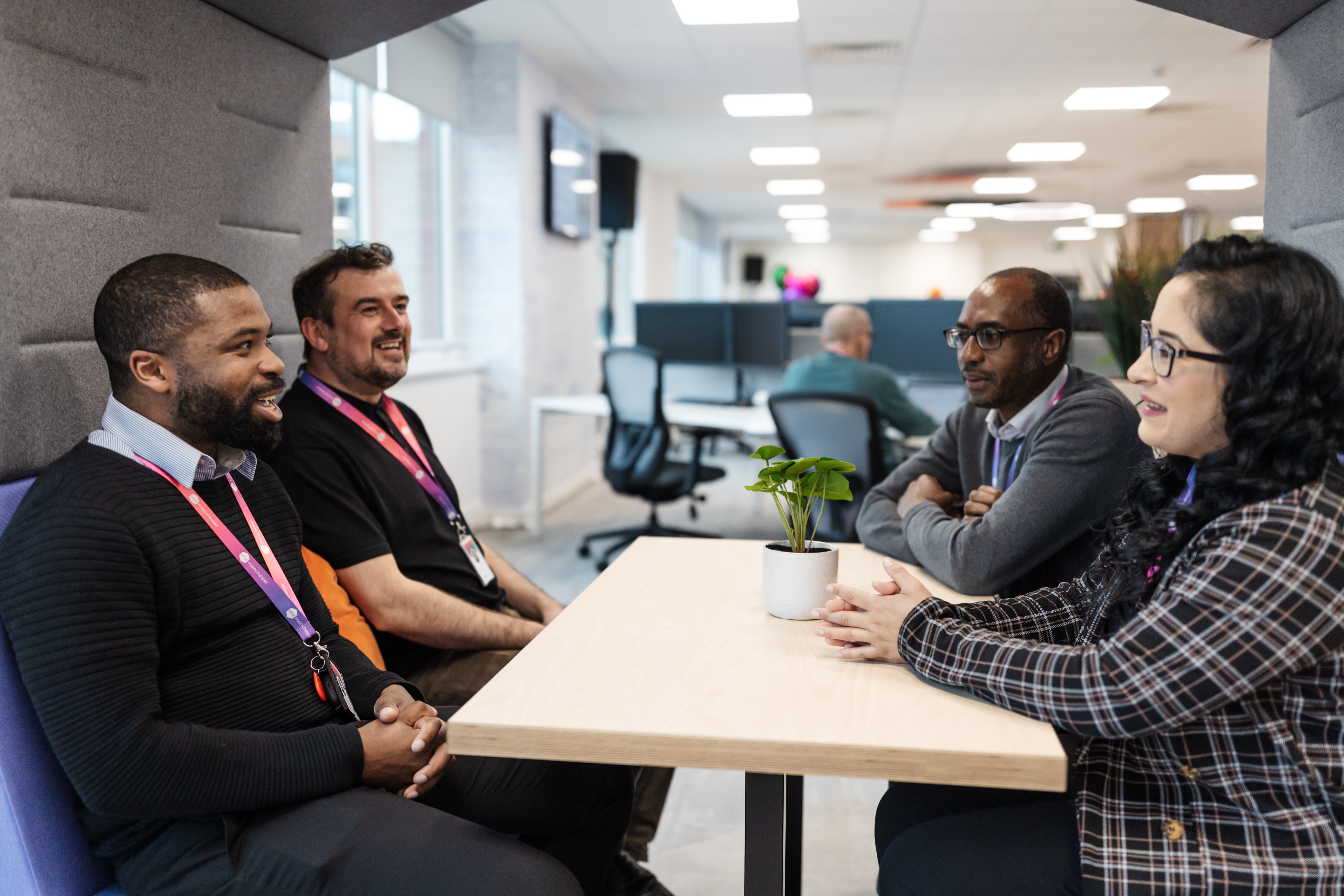 Colleagues laughing at office