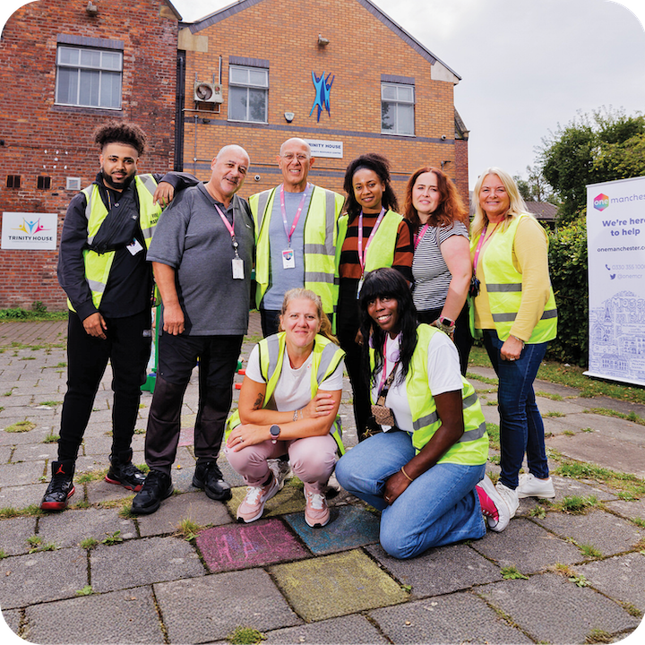 One Manchester Colleagues wearing high vis jackets