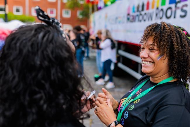 Colleague smiling at Pride 2022