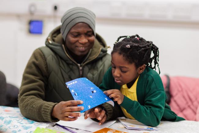 Two people doing crafts