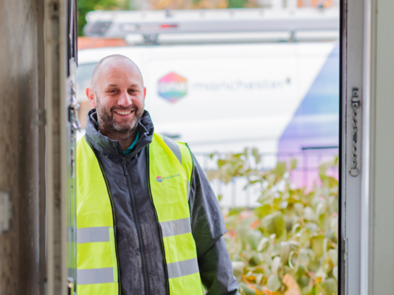 One Manchester Tradesperson wearing high visibility jacket.