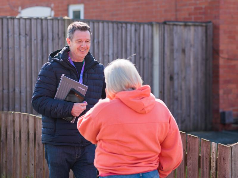 Man speaking to customer