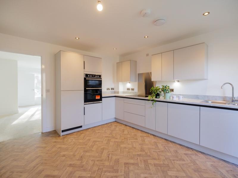 A newly renovated kitchen in a One Manchester development.