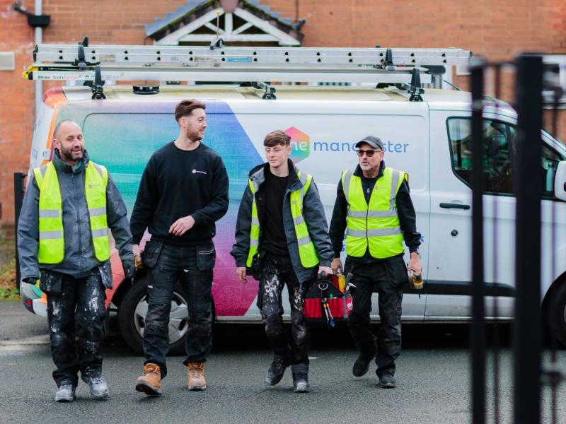 Colleagues walking from OM van