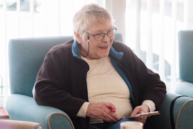 Independent Living resident sitting down