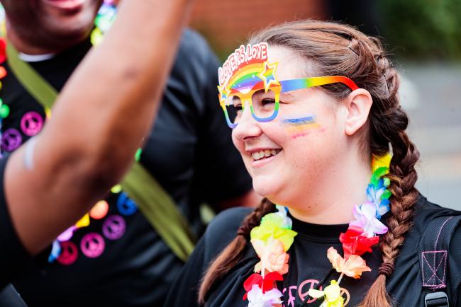 Person smiling at Pride 2022 