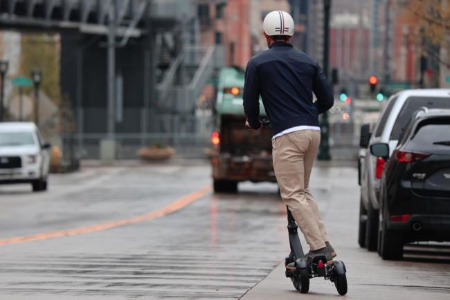 Man riding a scooter